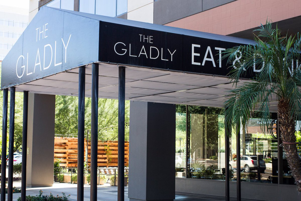 Exterior entrance of The Gladly restaurant in the Biltmore area of Phoenix, AZ